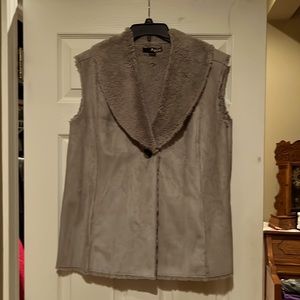 Vest. Soft suede feeling fabric on the outside, warm and fuzzy on the inside.